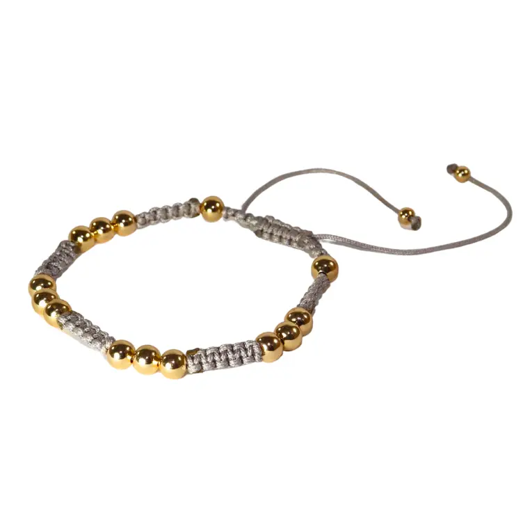 Pulsera tejida con balines de chapa de oro